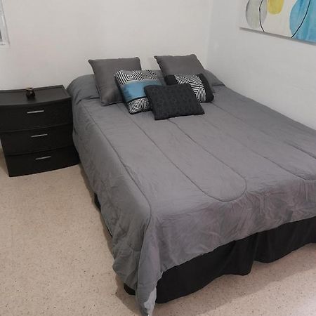 Cozy Apartment Across The San Juan Airport Exterior photo