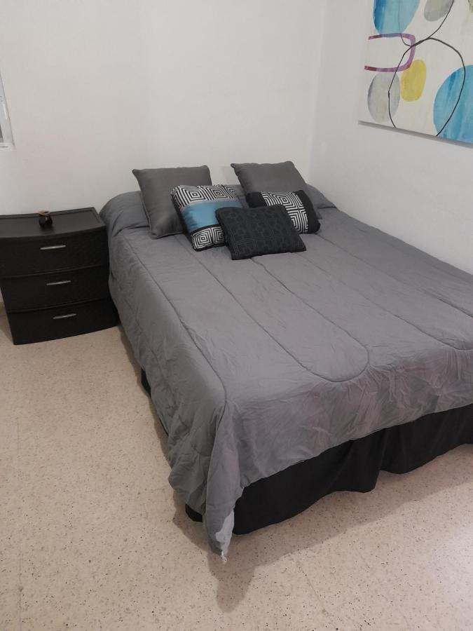 Cozy Apartment Across The San Juan Airport Exterior photo
