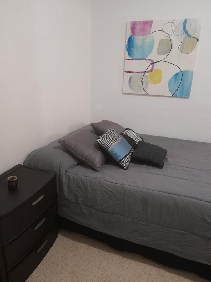 Cozy Apartment Across The San Juan Airport Exterior photo